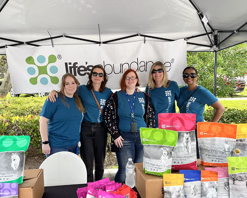 Life's Abundance team members at a Furry Friends adoption event